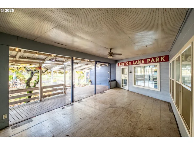 a living room with large windows
