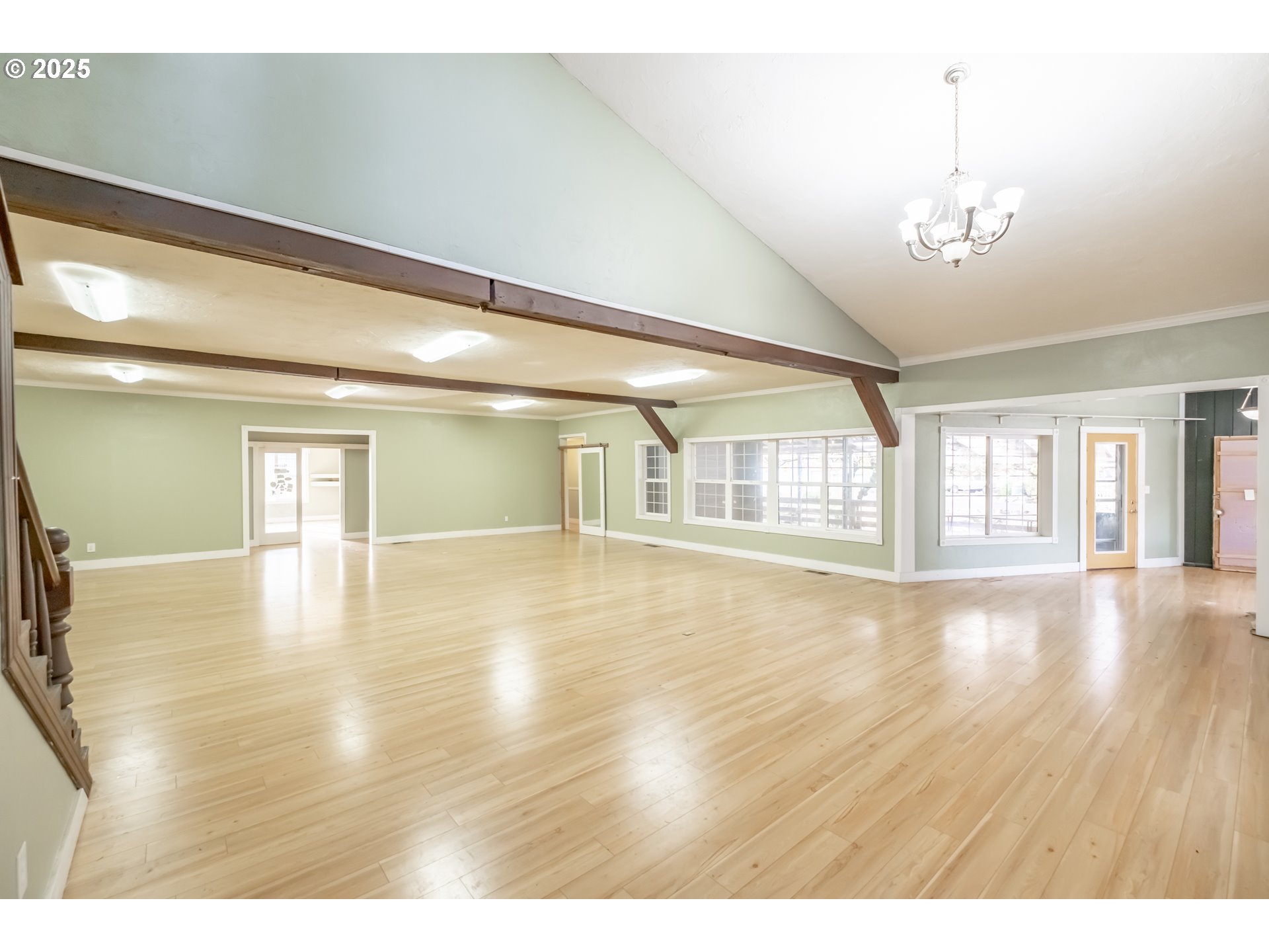 96470 Highway 99 Junction City, OR 97448 - Photo 9 of 48 a view of an empty room with wooden floor and a window