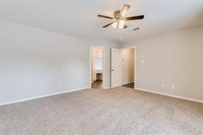 3210 Candlepine Drive Spring, TX 77388 - Photo 15 of 27 a view of an empty room with a ceiling fan