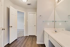 3210 Candlepine Drive Spring, TX 77388 - Photo 19 of 27 a view of a bathroom with a sink toilet and tub