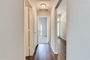 3210 Candlepine Drive Spring, TX 77388 - Photo 21 of 27 a view of a hallway with wooden floor