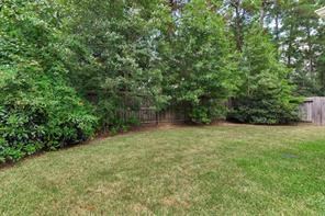 3210 Candlepine Drive Spring, TX 77388 - Photo 26 of 27 a view of a yard with a tree
