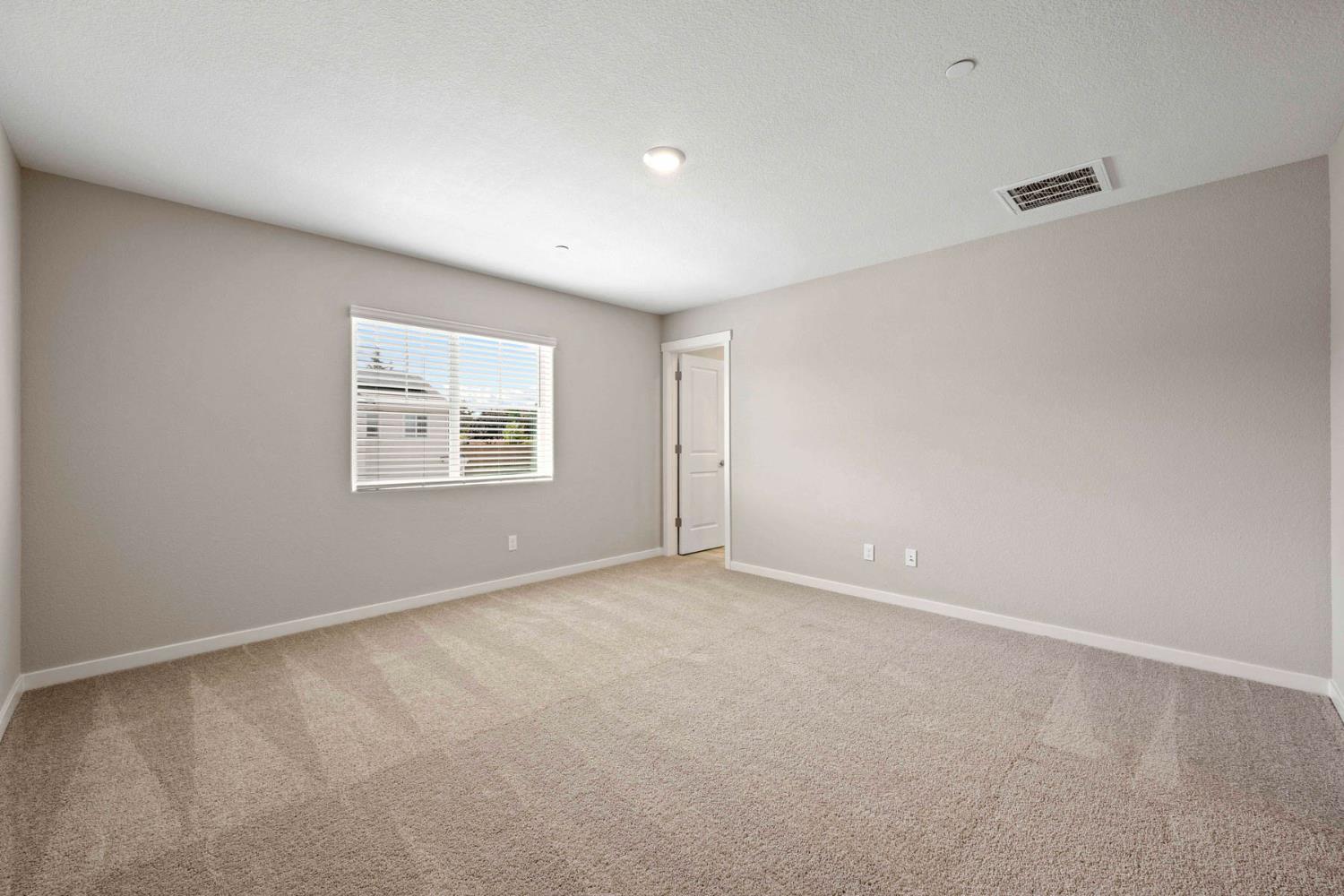 2972 Bowery Lane Lincoln, CA 95648 - Photo 12 of 23 an empty room with windows