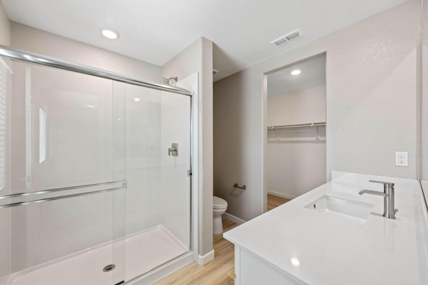 2972 Bowery Lane Lincoln, CA 95648 - Photo 15 of 23 a bathroom with a shower and a sink