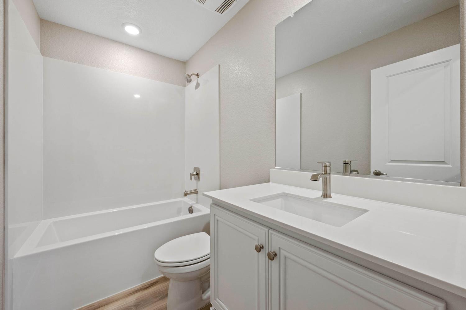 2972 Bowery Lane Lincoln, CA 95648 - Photo 19 of 23 a bathroom with a sink a toilet and shower