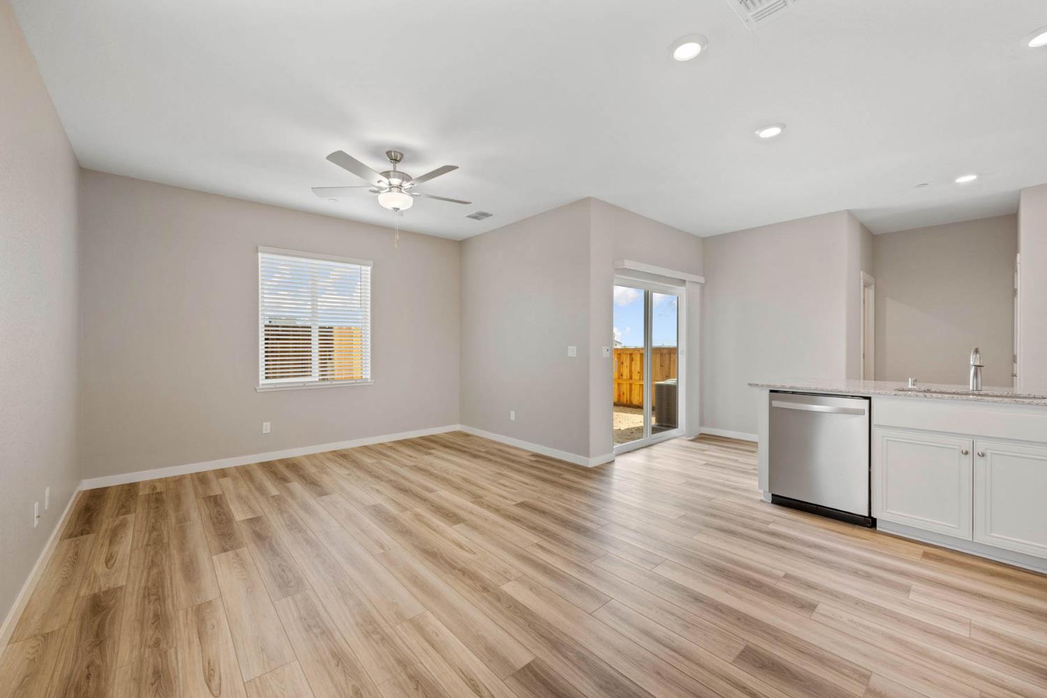 2972 Bowery Lane Lincoln, CA 95648 - Photo 7 of 23 a view of an empty room with window and wooden floor