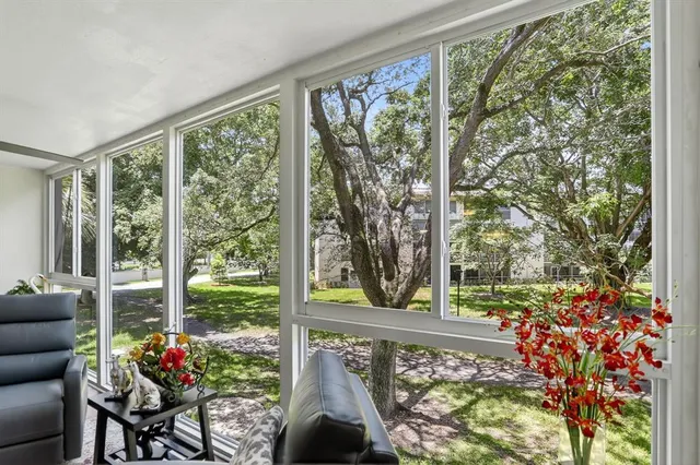 a outdoor living space with furniture and garden view