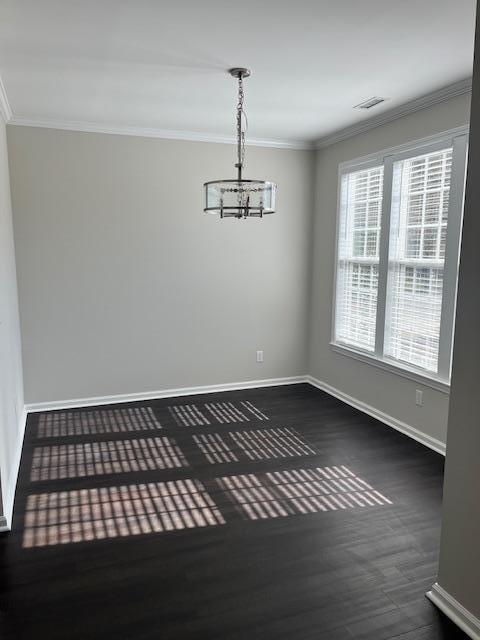 5405 Glass Ridge Road Raleigh, NC 27616 - Photo 7 of 18 a view of a room with wooden floor and windows