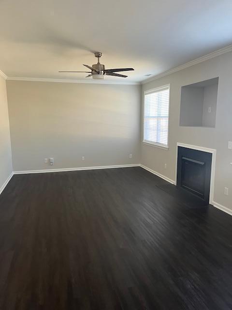 5405 Glass Ridge Road Raleigh, NC 27616 - Photo 8 of 18 an empty room with wooden floor fan and windows