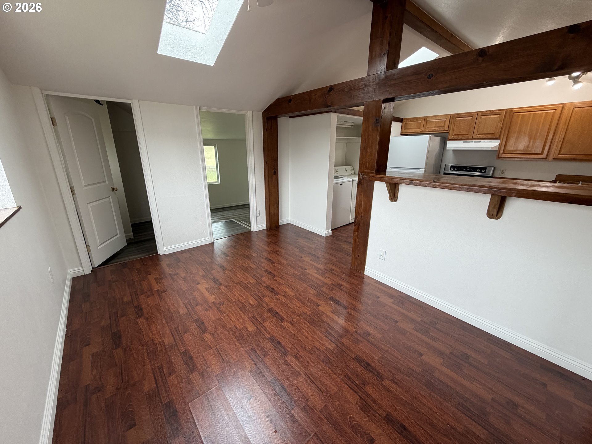 150 South 5th Street Lakeside, OR 97449 - Photo 7 of 19 a view of a hallway with wooden floor