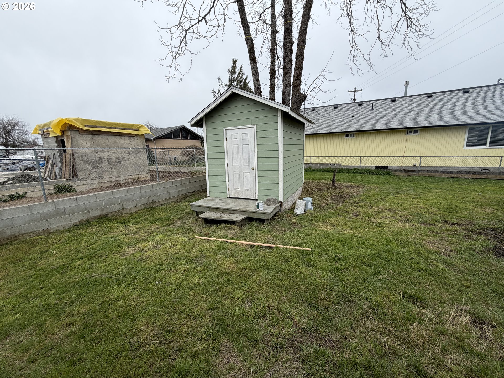 150 South 5th Street Lakeside, OR 97449 - Photo 10 of 19 a backyard of a house
