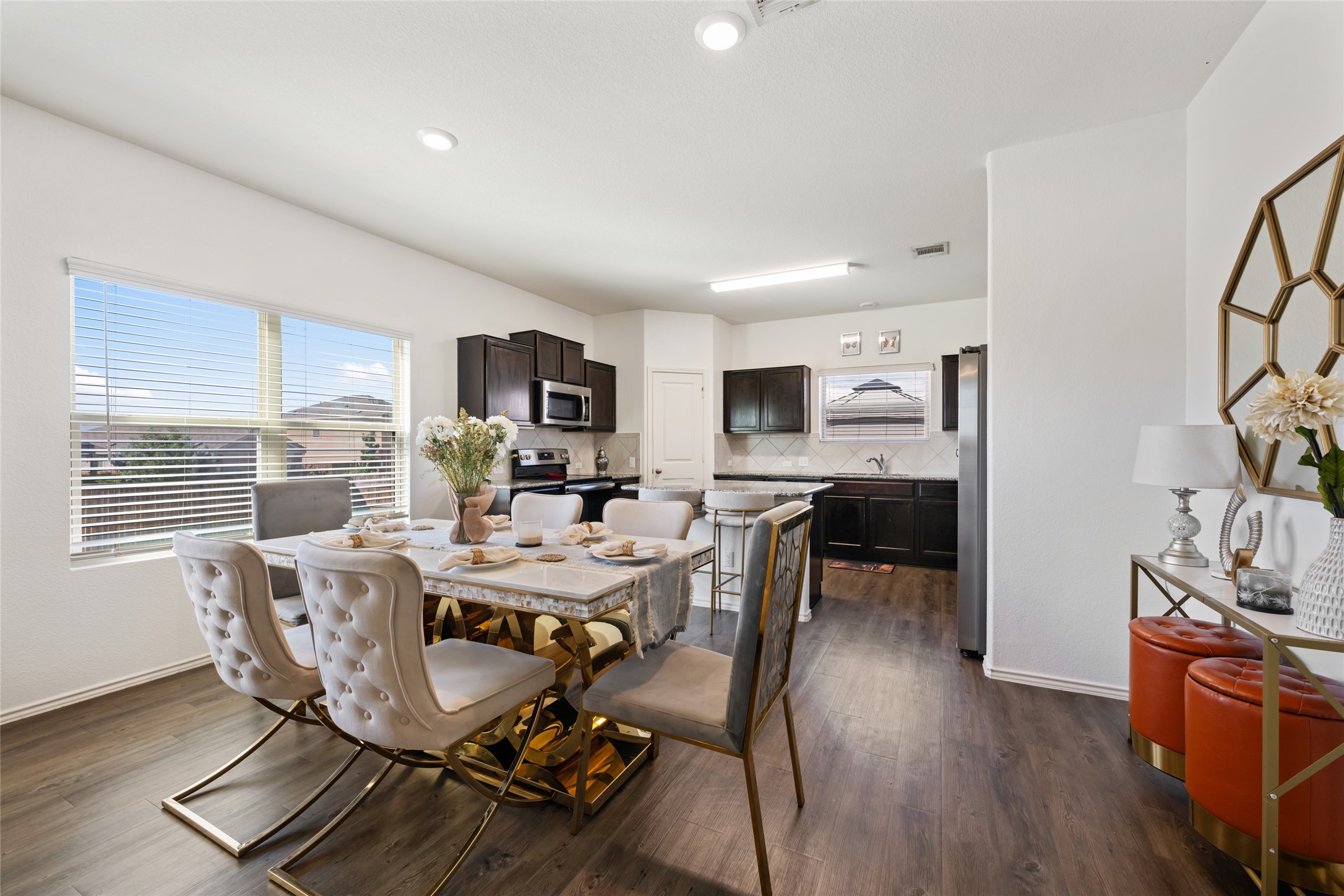 524 Circle Way, Unit 12F Jarrell, TX 76537 - Photo 8 of 34 Dining space featuring dark wood-type flooring and baseboards