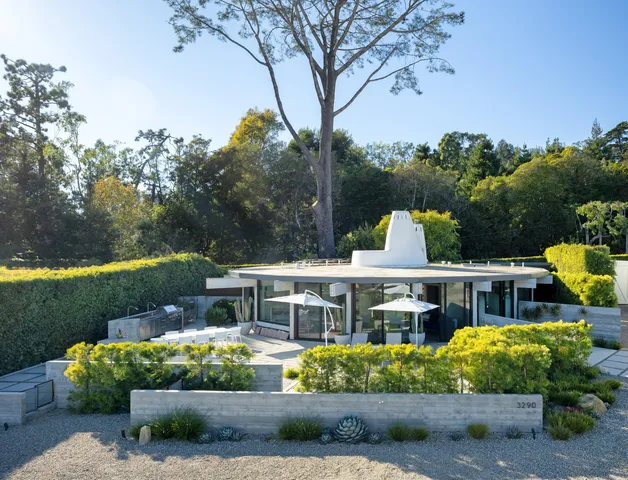 a front view of house with a yard