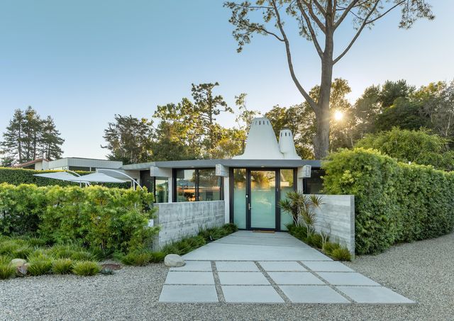 front view of a house with a yard