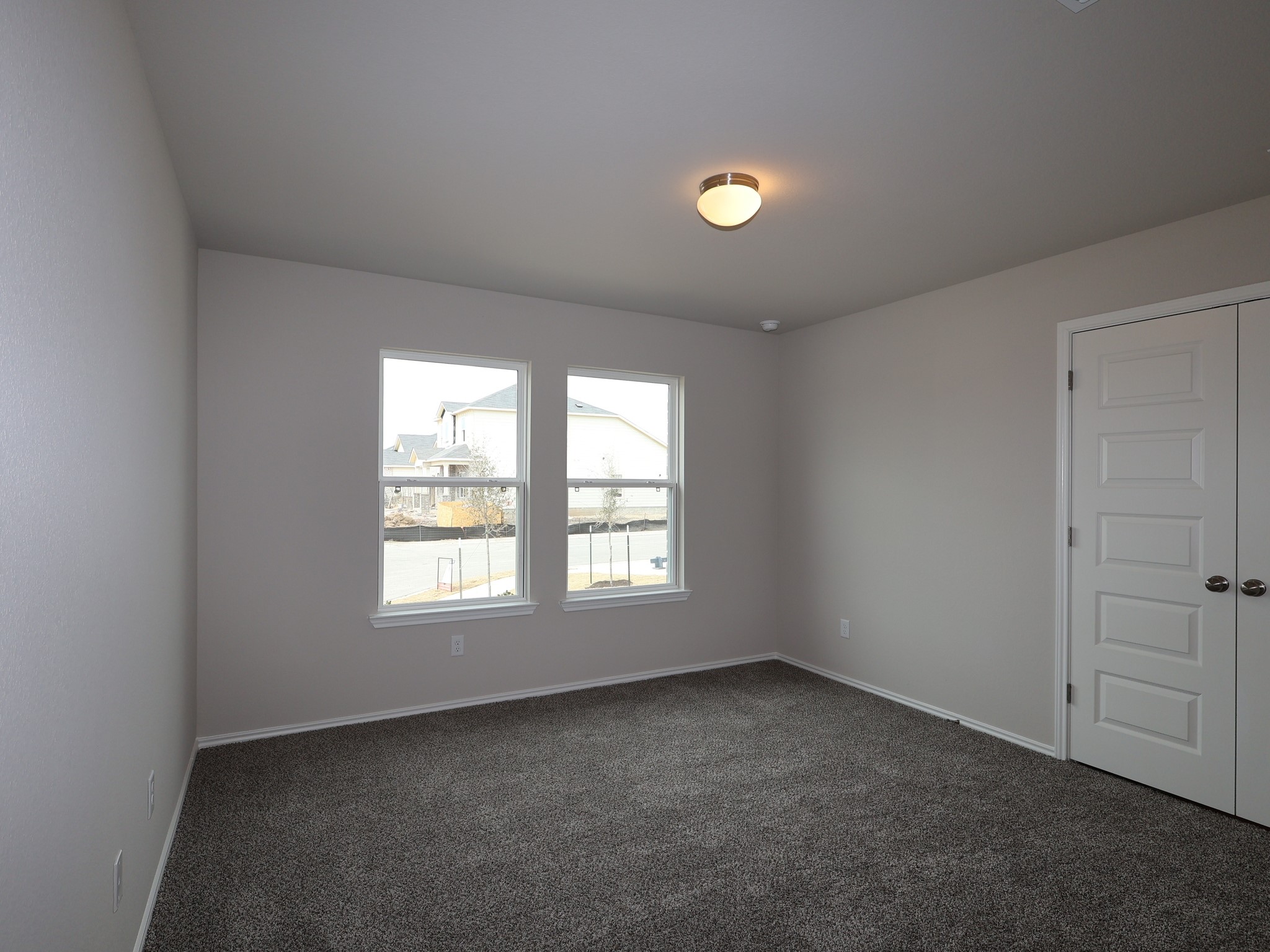 13701 Warnock Trail Manor, TX 78653 - Photo 14 of 22 an empty room with windows