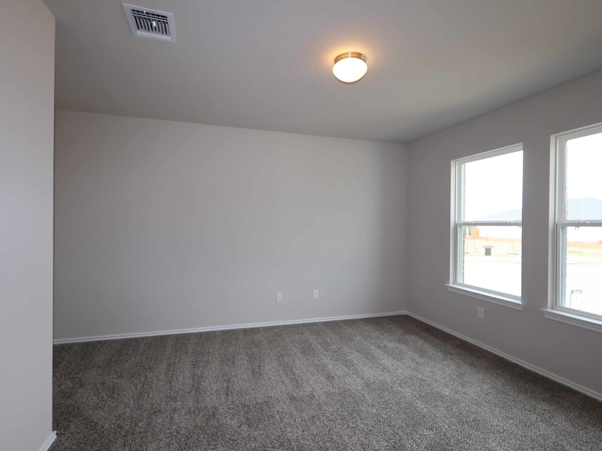 13701 Warnock Trail Manor, TX 78653 - Photo 15 of 22 an empty room with a window