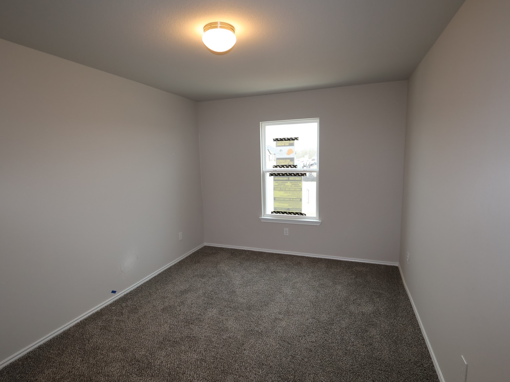 13701 Warnock Trail Manor, TX 78653 - Photo 18 of 22 an empty room with a window