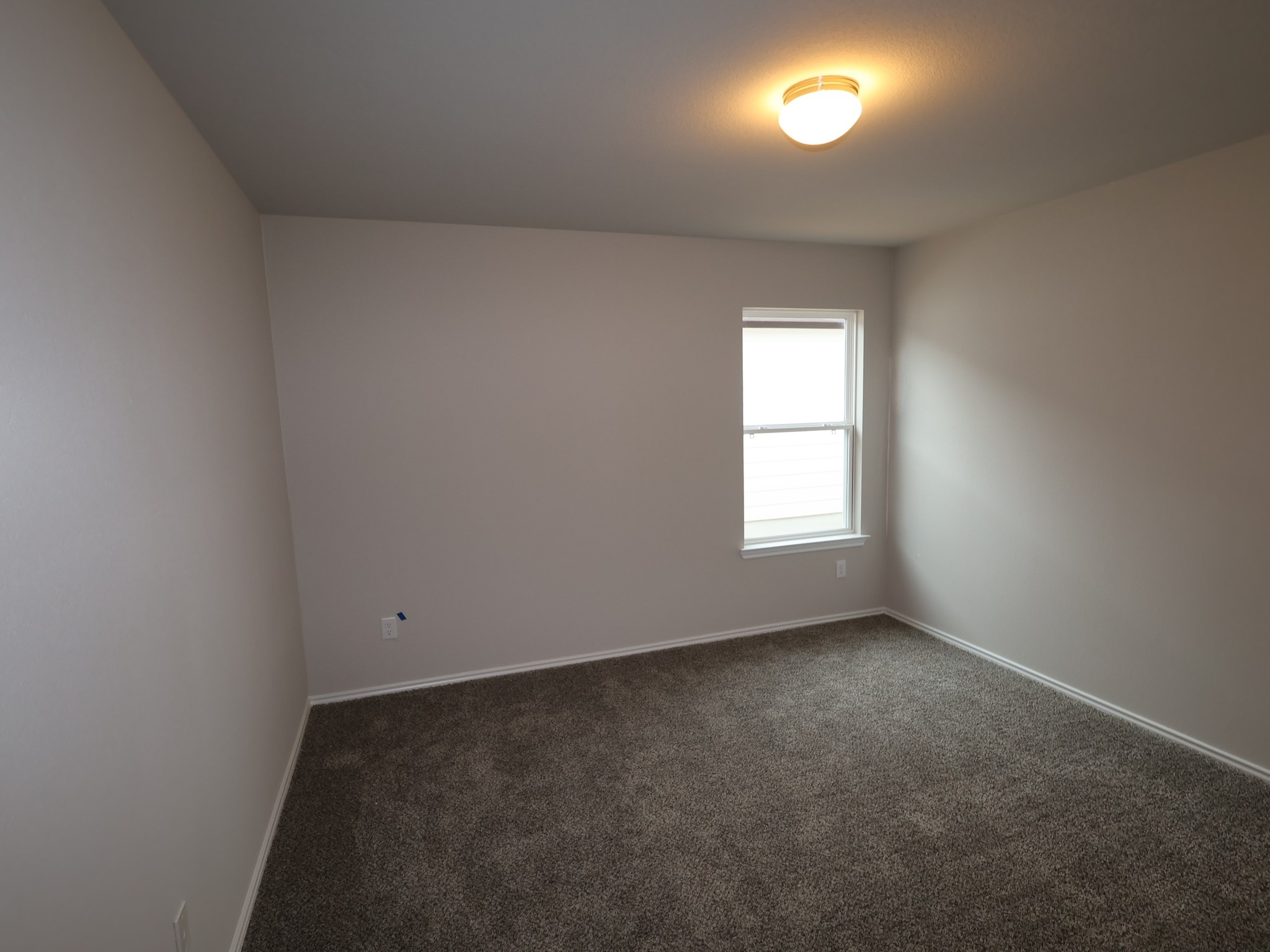 13701 Warnock Trail Manor, TX 78653 - Photo 20 of 22 an empty room with a window