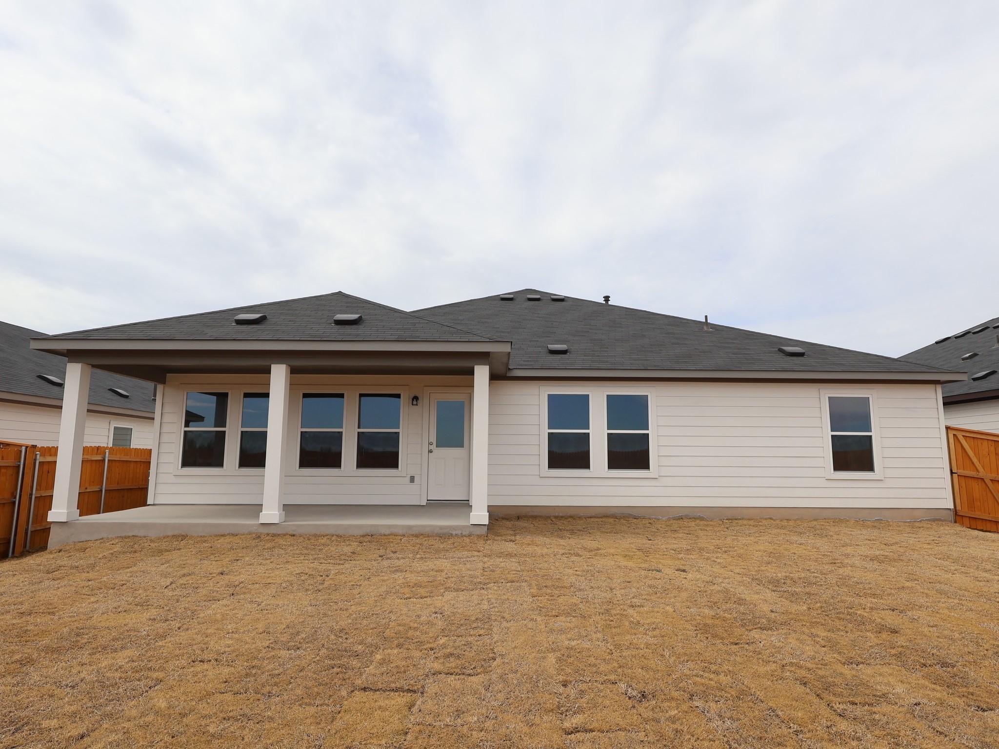 13701 Warnock Trail Manor, TX 78653 - Photo 21 of 22 front view of a house with a yard