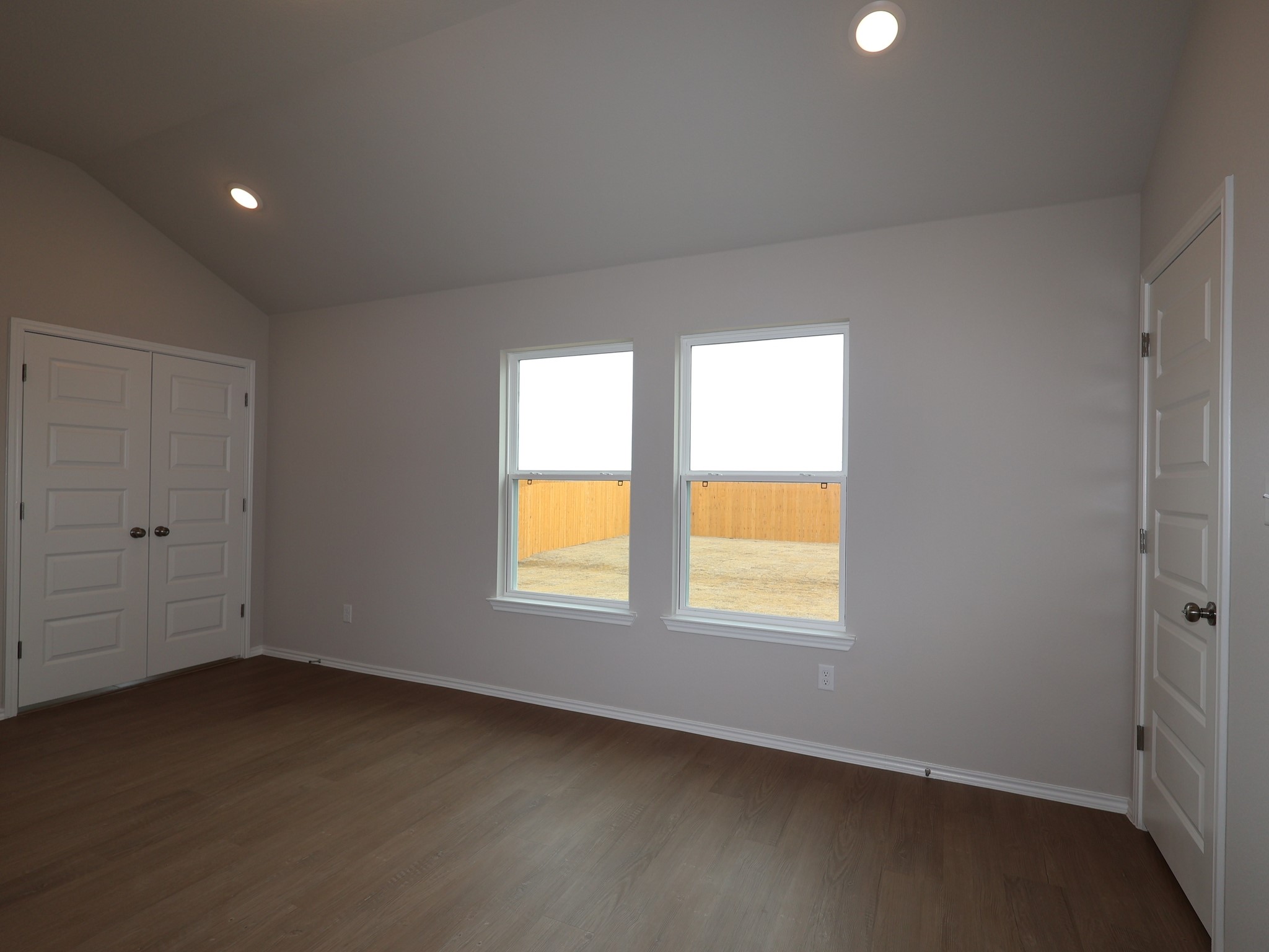 13701 Warnock Trail Manor, TX 78653 - Photo 9 of 22 an empty room with a window