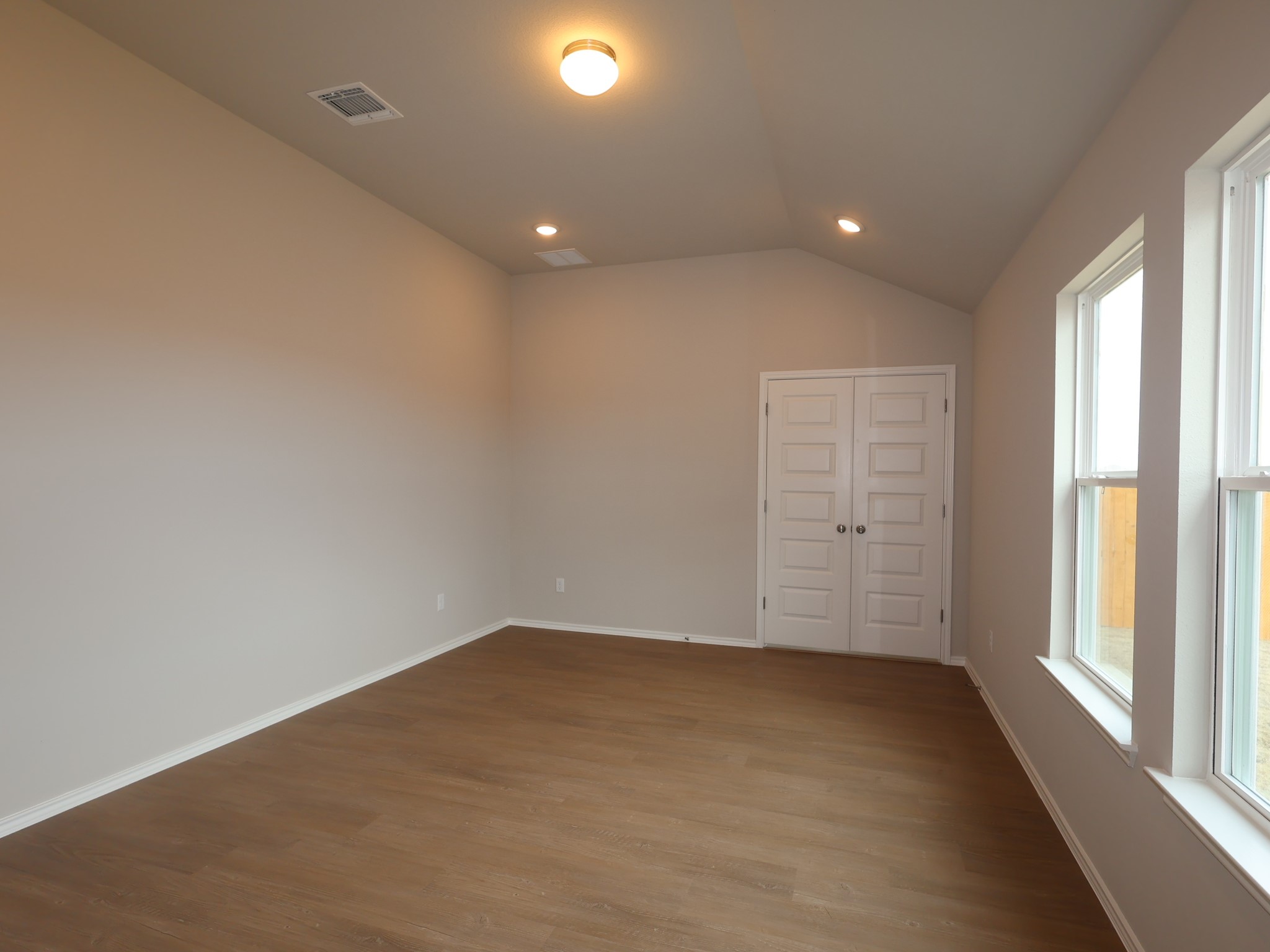 13701 Warnock Trail Manor, TX 78653 - Photo 10 of 22 an empty room with windows