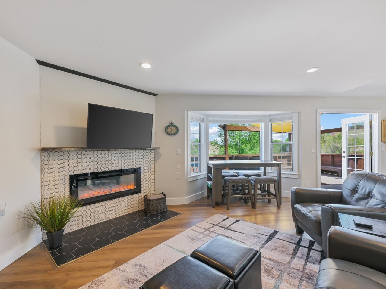 383 Explorer Court, Unit B Grand Junction, CO 81507 - Photo 9 of 40 a living room with furniture and a fireplace