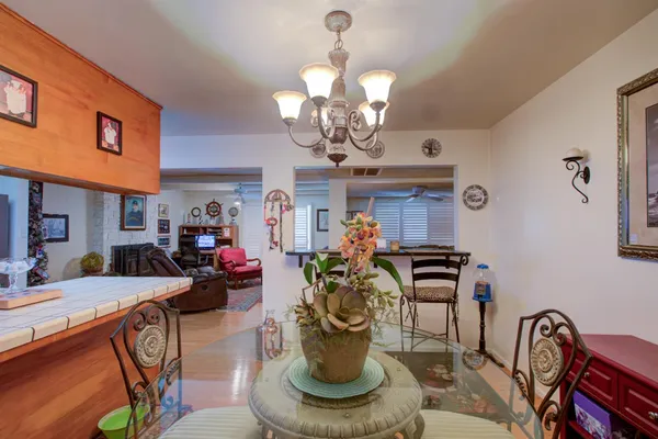 a kitchen with stainless steel appliances granite countertop sink stove and cabinets