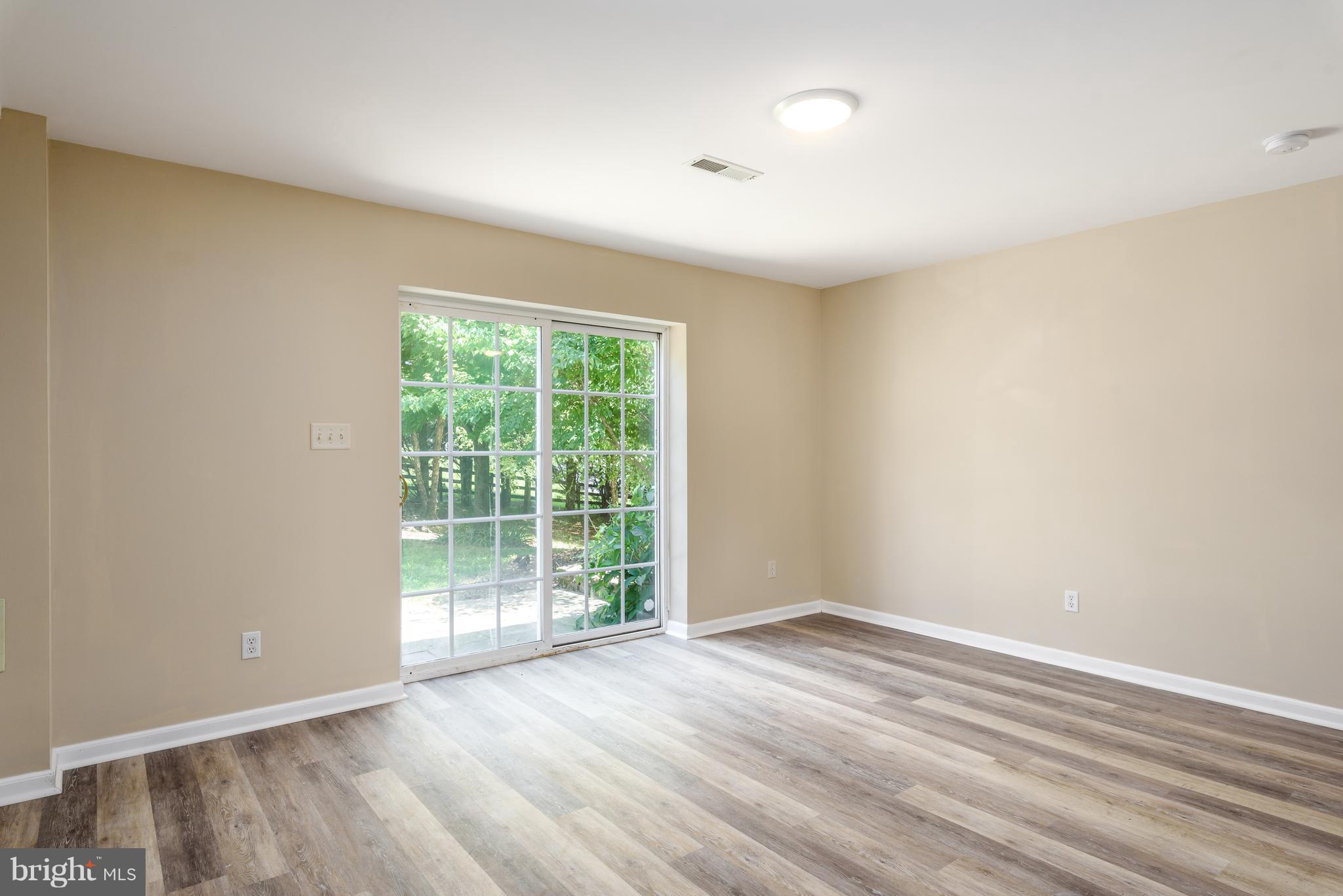 7524 Woodville Road Mount Airy, MD 21771 - Photo 16 of 22 New flooring, fresh paint and walk out level