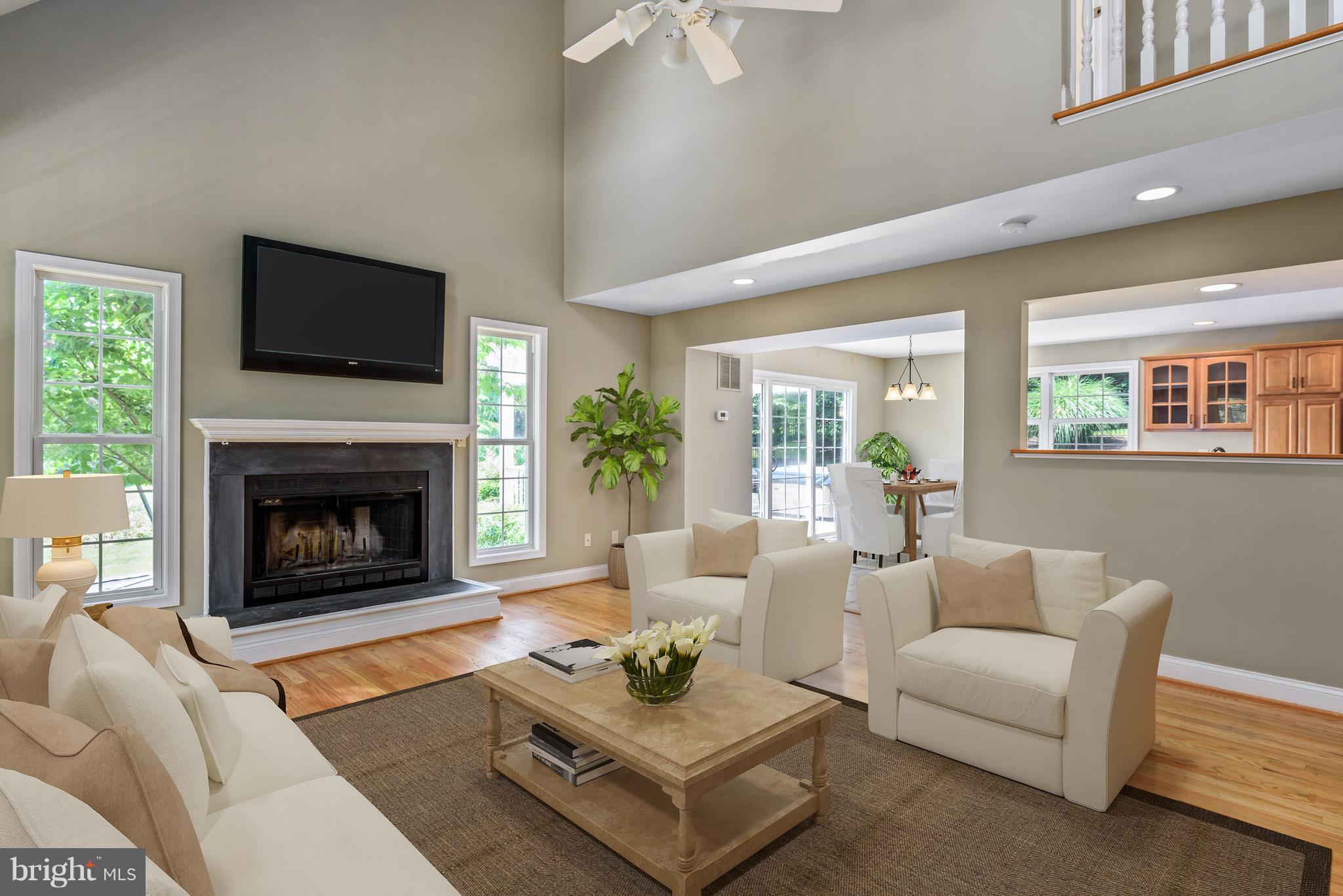 Two story family room with wood burning fire