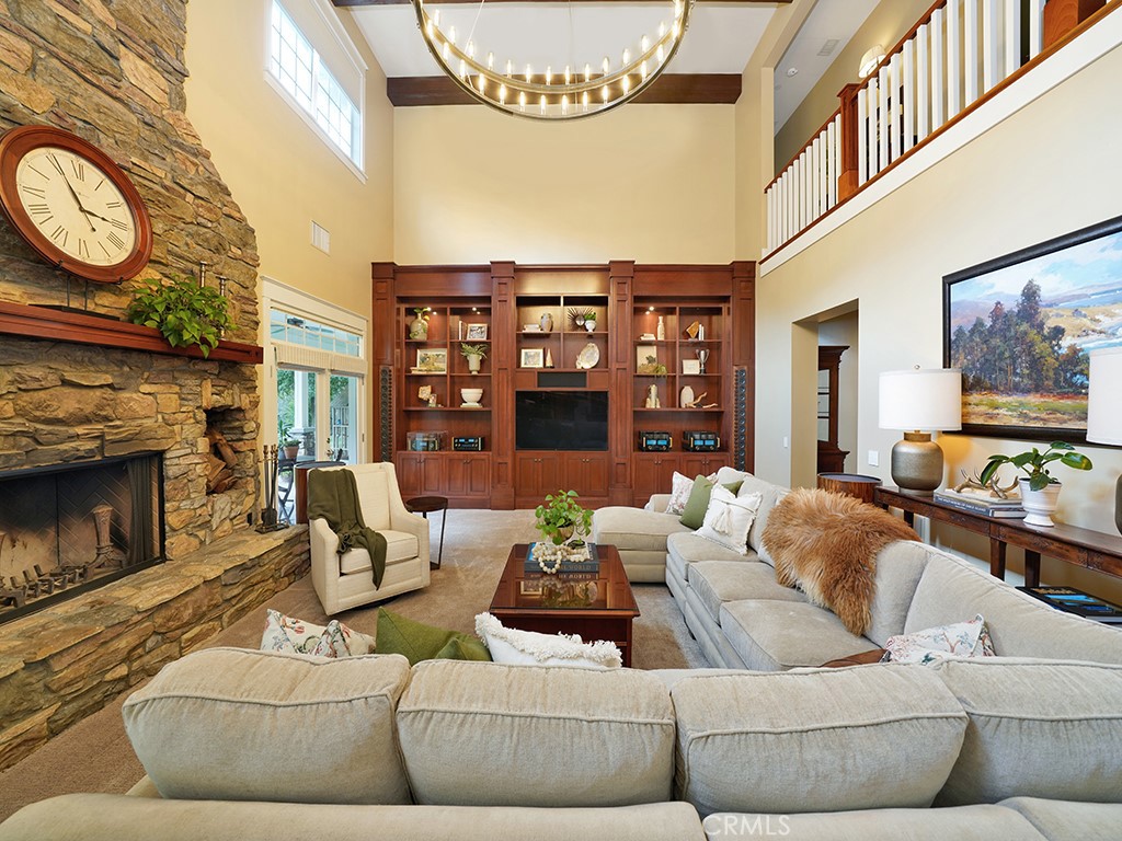 28291 Williams Canyon Road Silverado, CA 92676 - Photo 12 of 74 a living room with furniture a fireplace and a large window