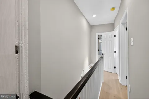 a view of hallway with stairs