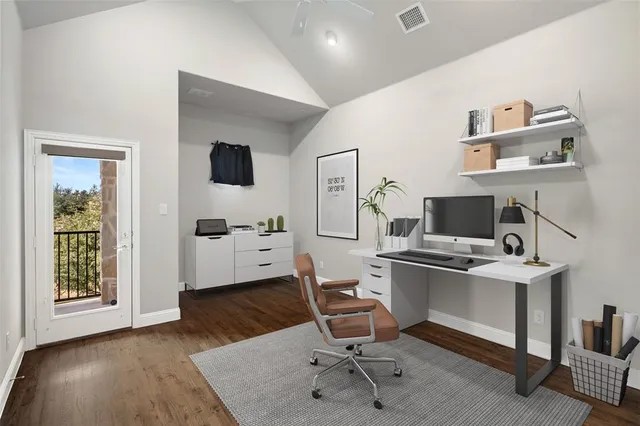 a workspace with furniture and window