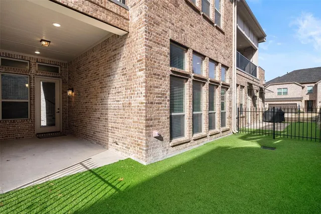 a view of backyard with a garden and stairs