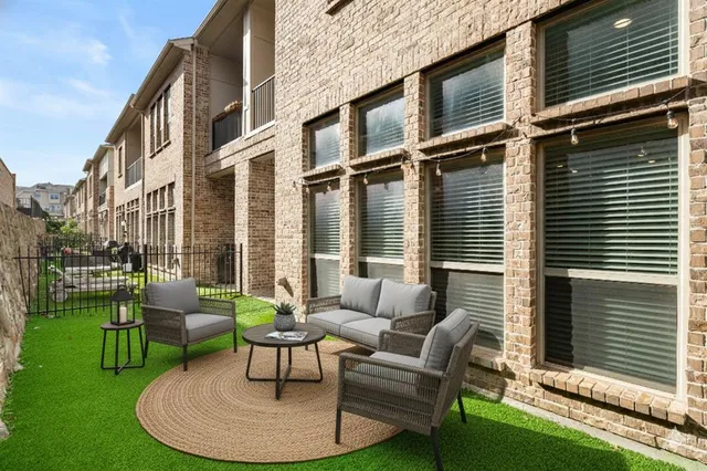 a building outdoor space with patio furniture