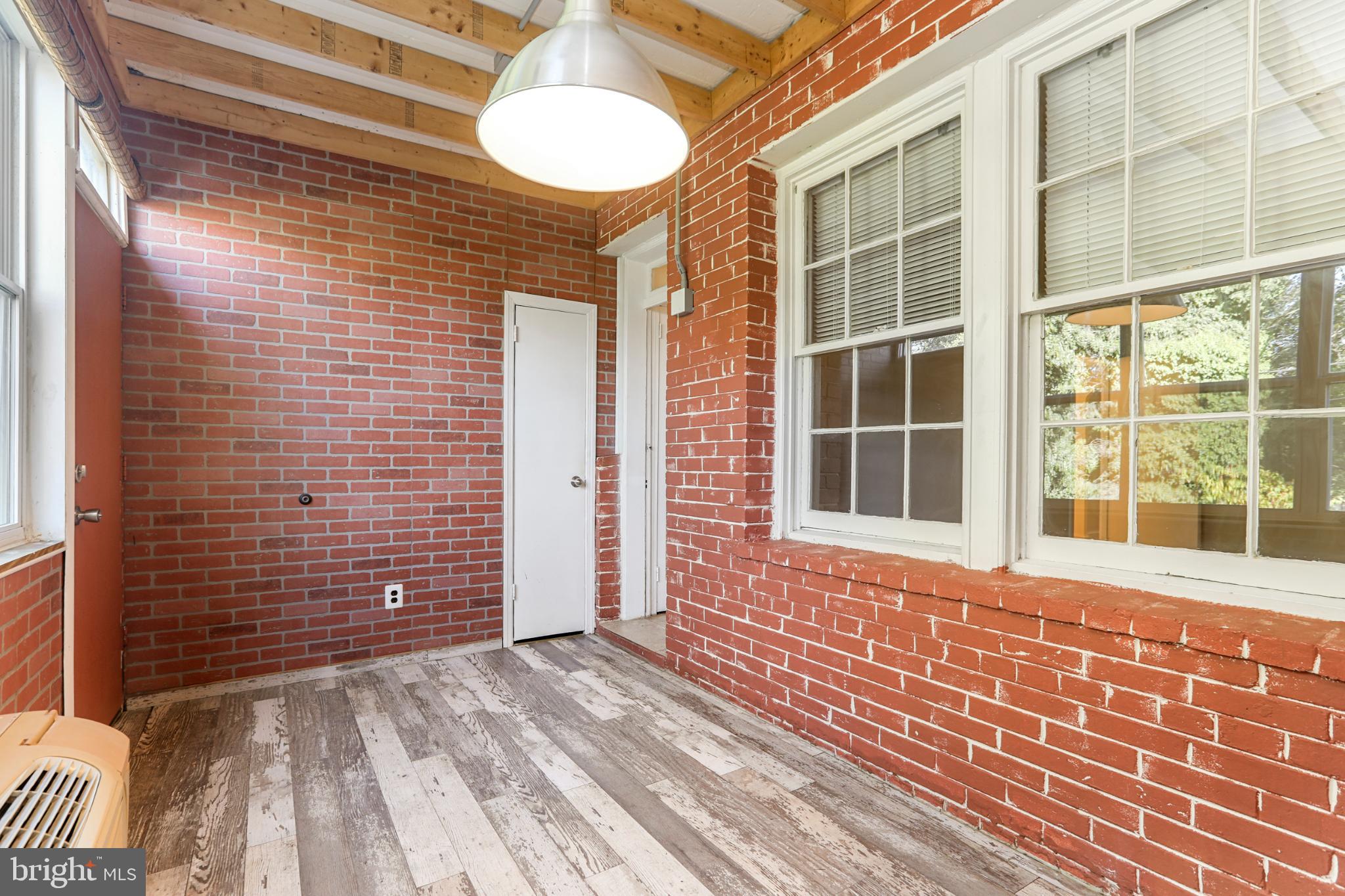 4016 47th Street Northwest, Unit 2 Washington, DC 20016 - Photo 21 of 27 a view of a brick building with a window