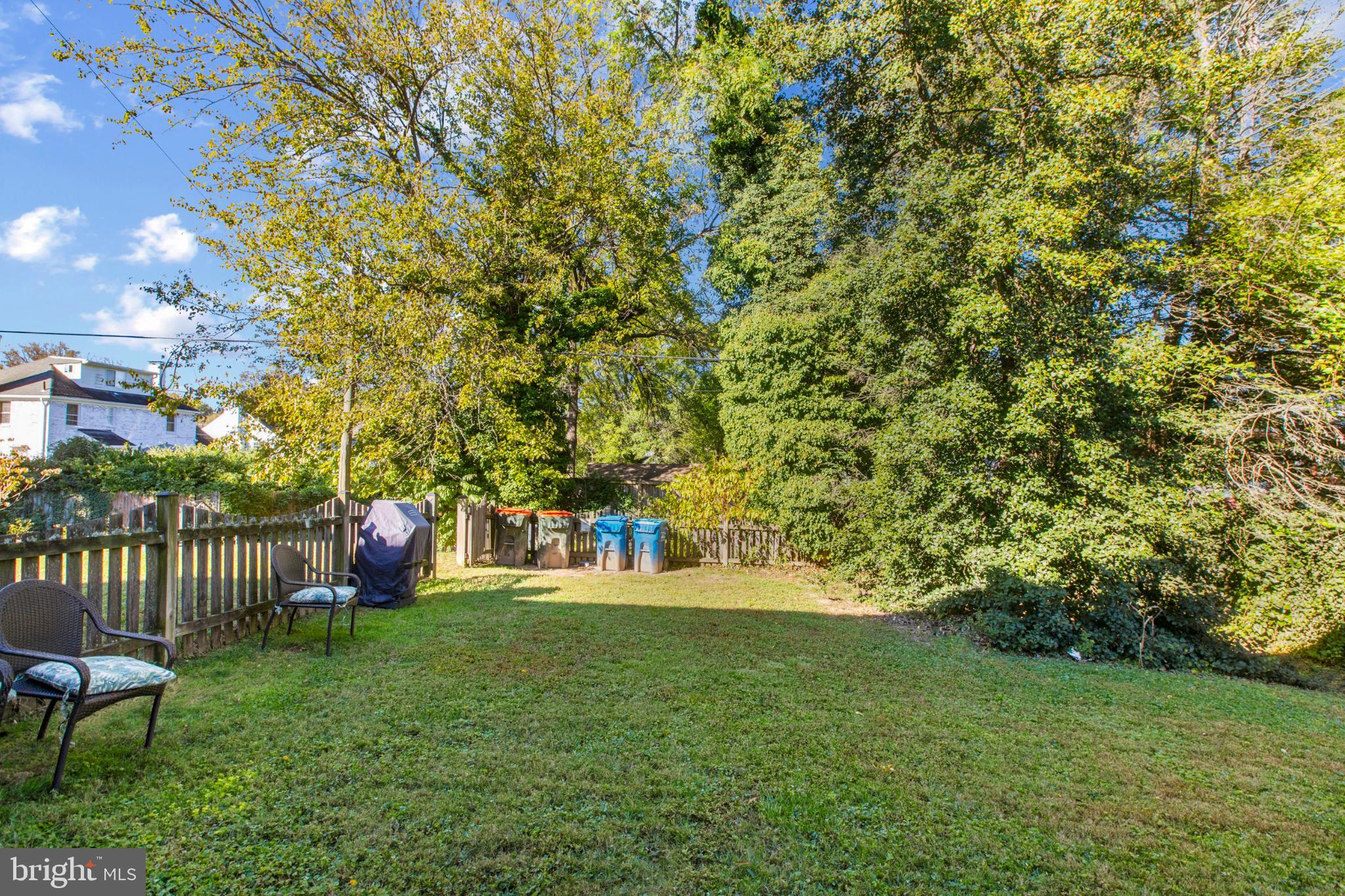 4016 47th Street Northwest, Unit 2 Washington, DC 20016 - Photo 22 of 27 a view of a garden with a bench