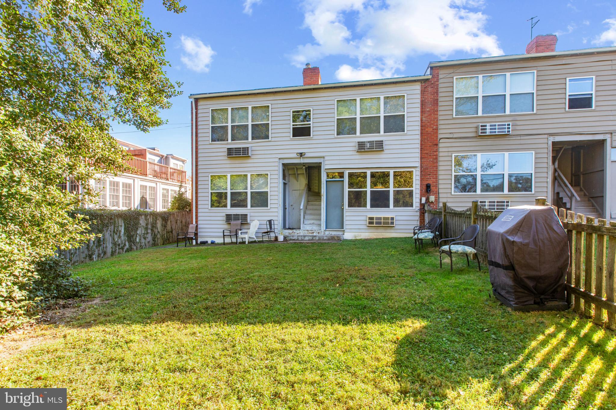 4016 47th Street Northwest, Unit 2 Washington, DC 20016 - Photo 24 of 27 a view of a house with backyard and sitting area
