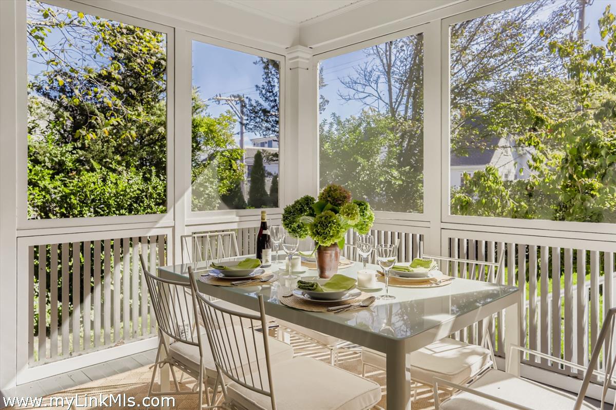 27 Spring Street Vineyard Haven, MA 02568 - Photo 6 of 58 a view of a dining room with furniture window and outside view