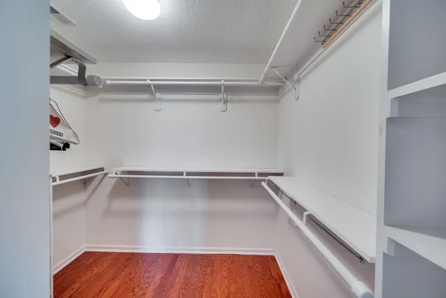 a view of an empty walk in closet