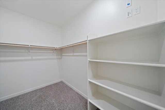 a view of an empty walk in closet