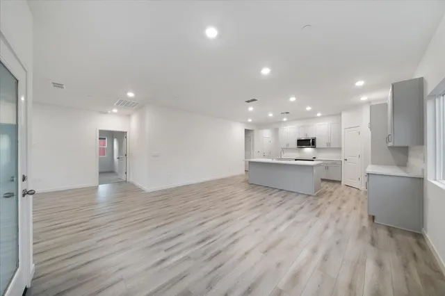 a view of kitchen with wooden floor