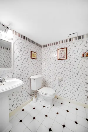 a utility room with a sink a washer and dryer