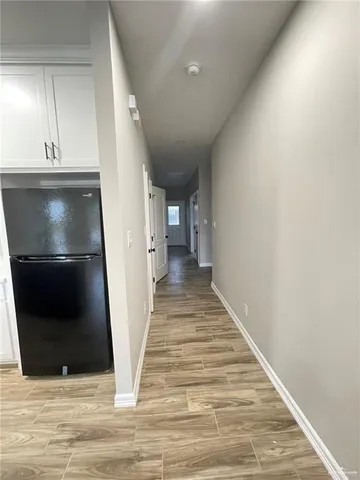 a view of kitchen island with cabinets