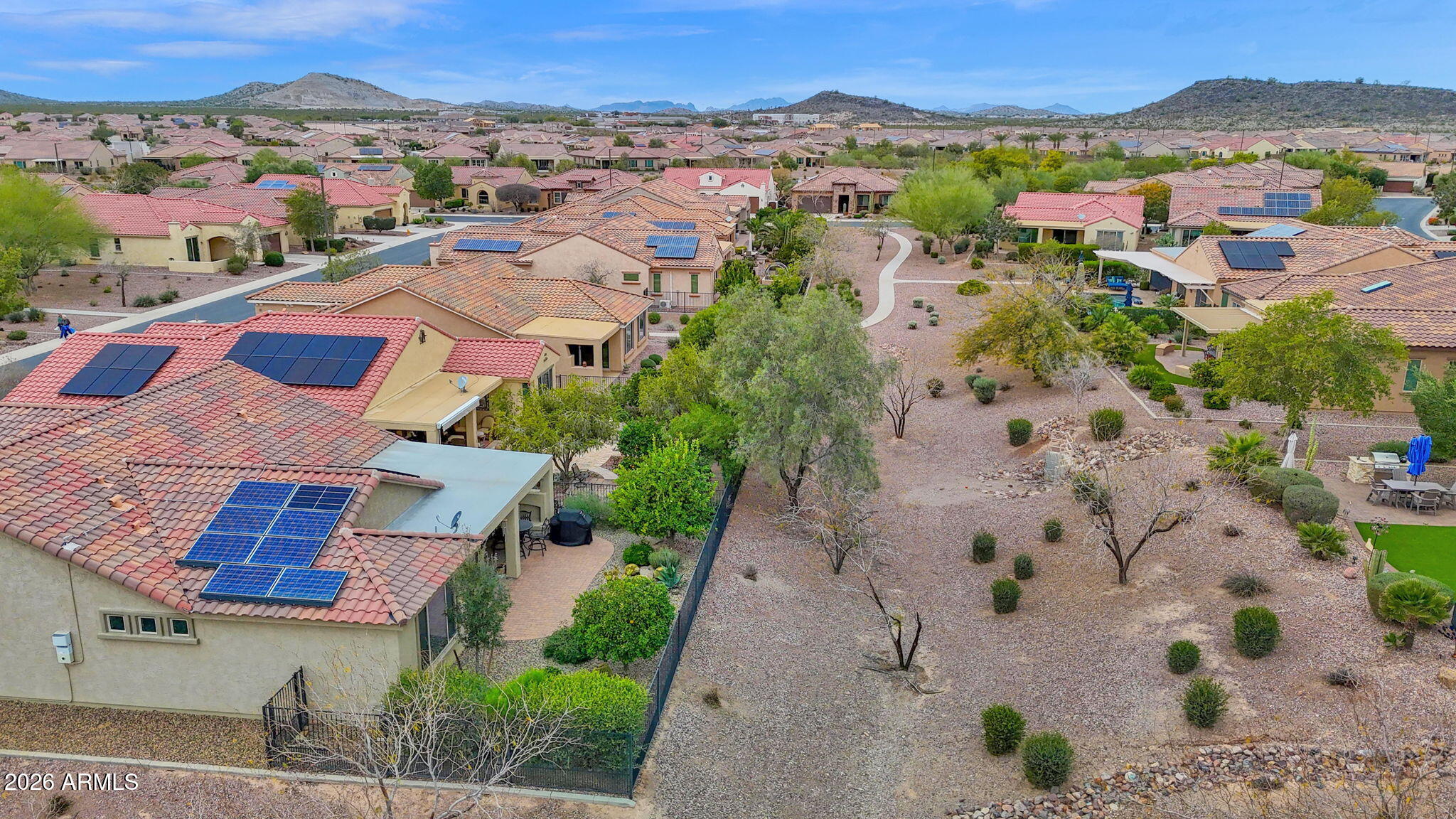 7438 West Noble Prairie Way Florence, AZ 85132 - Photo 38 of 38 an aerial view of residential houses with outdoor space