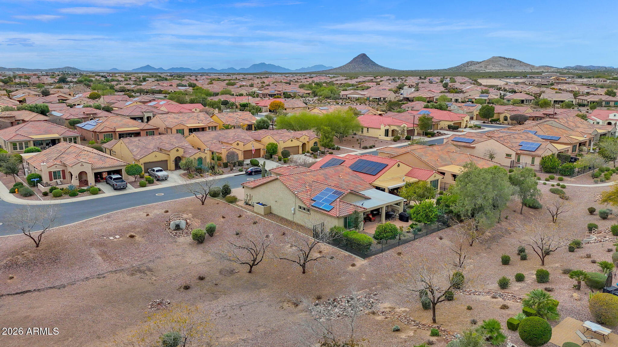 7438 West Noble Prairie Way Florence, AZ 85132 - Photo 8 of 38 an aerial view of residential houses with outdoor space