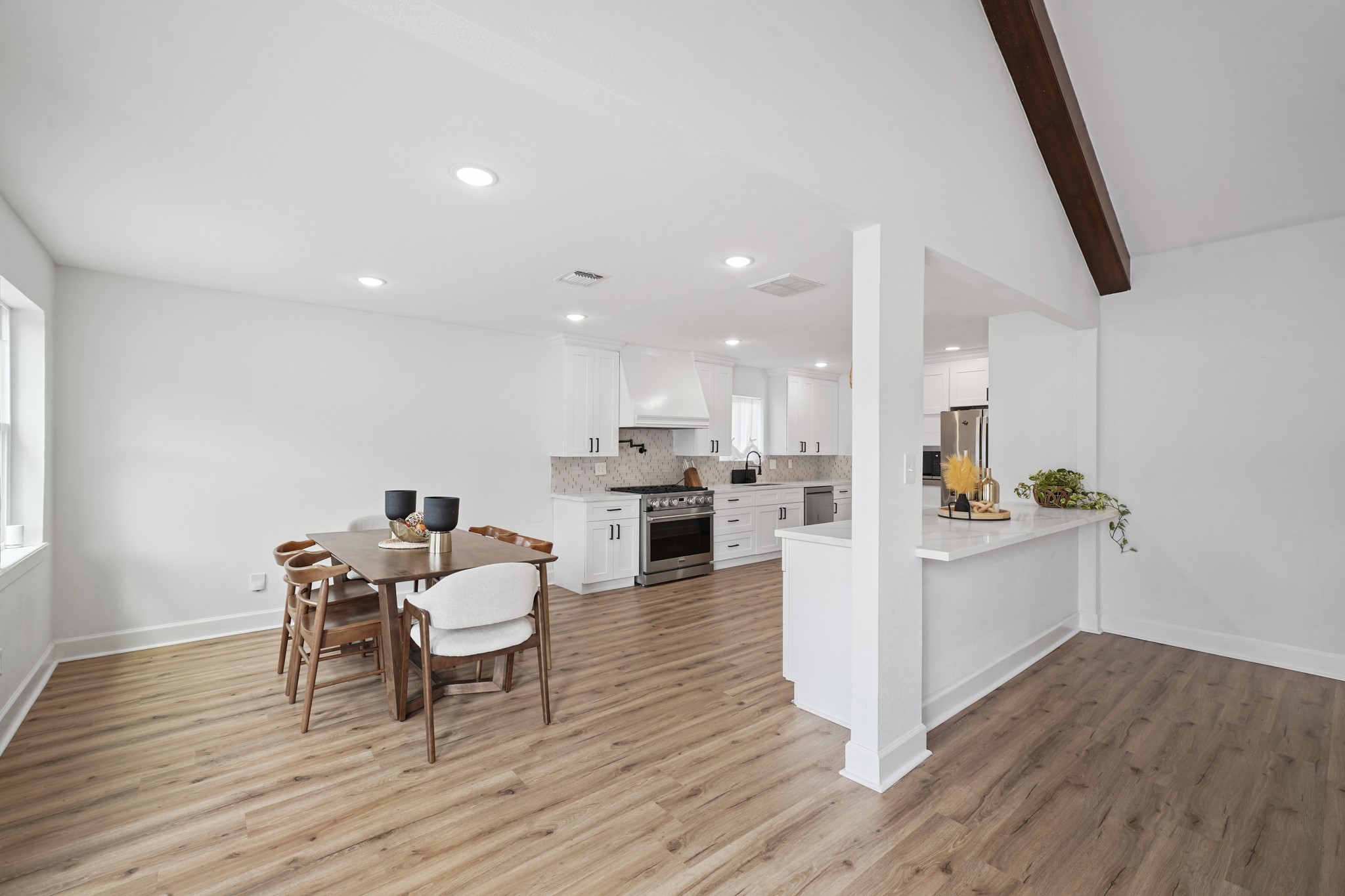 10031 Inwood Drive Houston, TX 77042 - Photo 11 of 31 a living room with furniture and a wooden floor