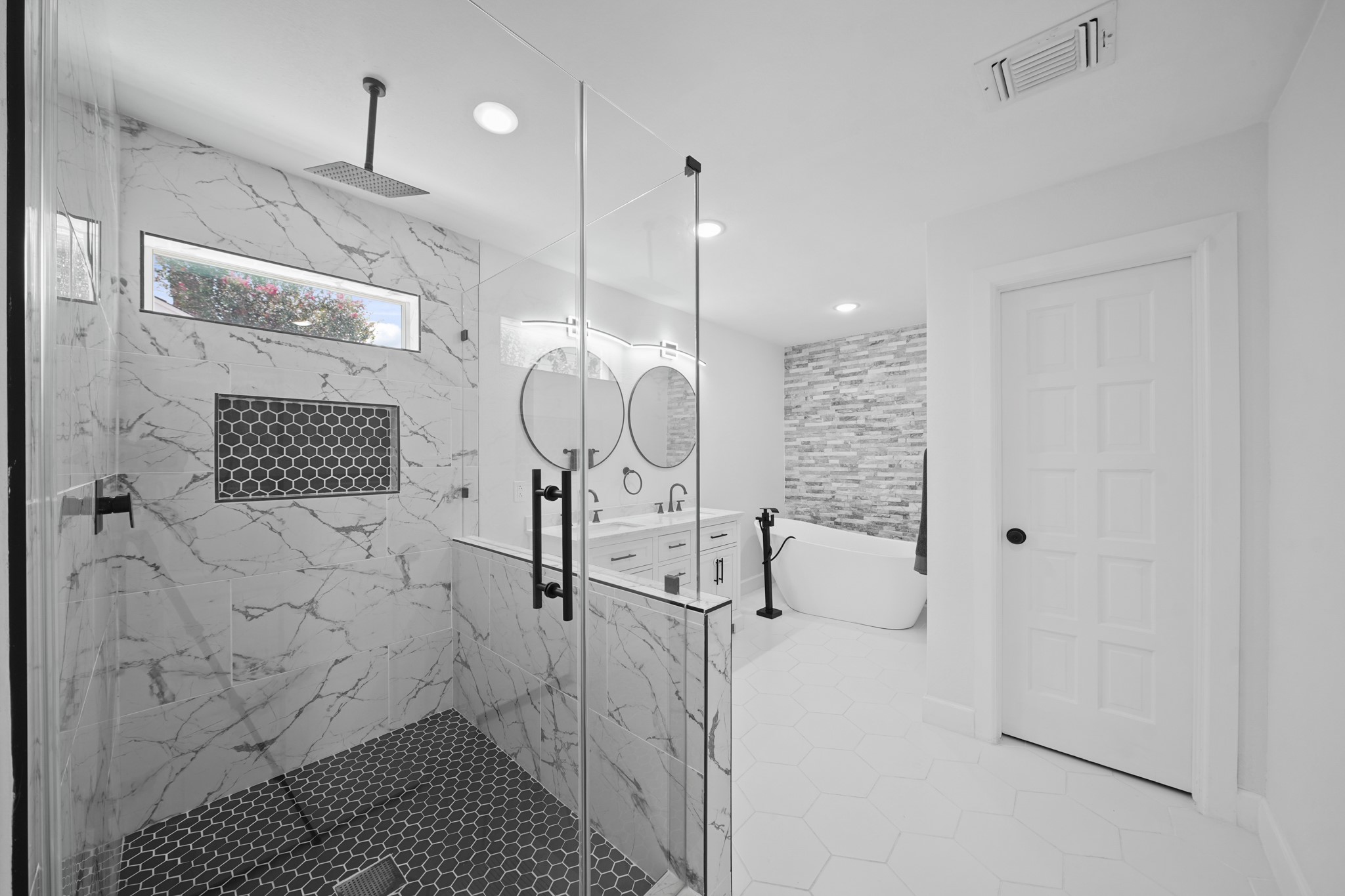 10031 Inwood Drive Houston, TX 77042 - Photo 18 of 31 a bathroom with a shower