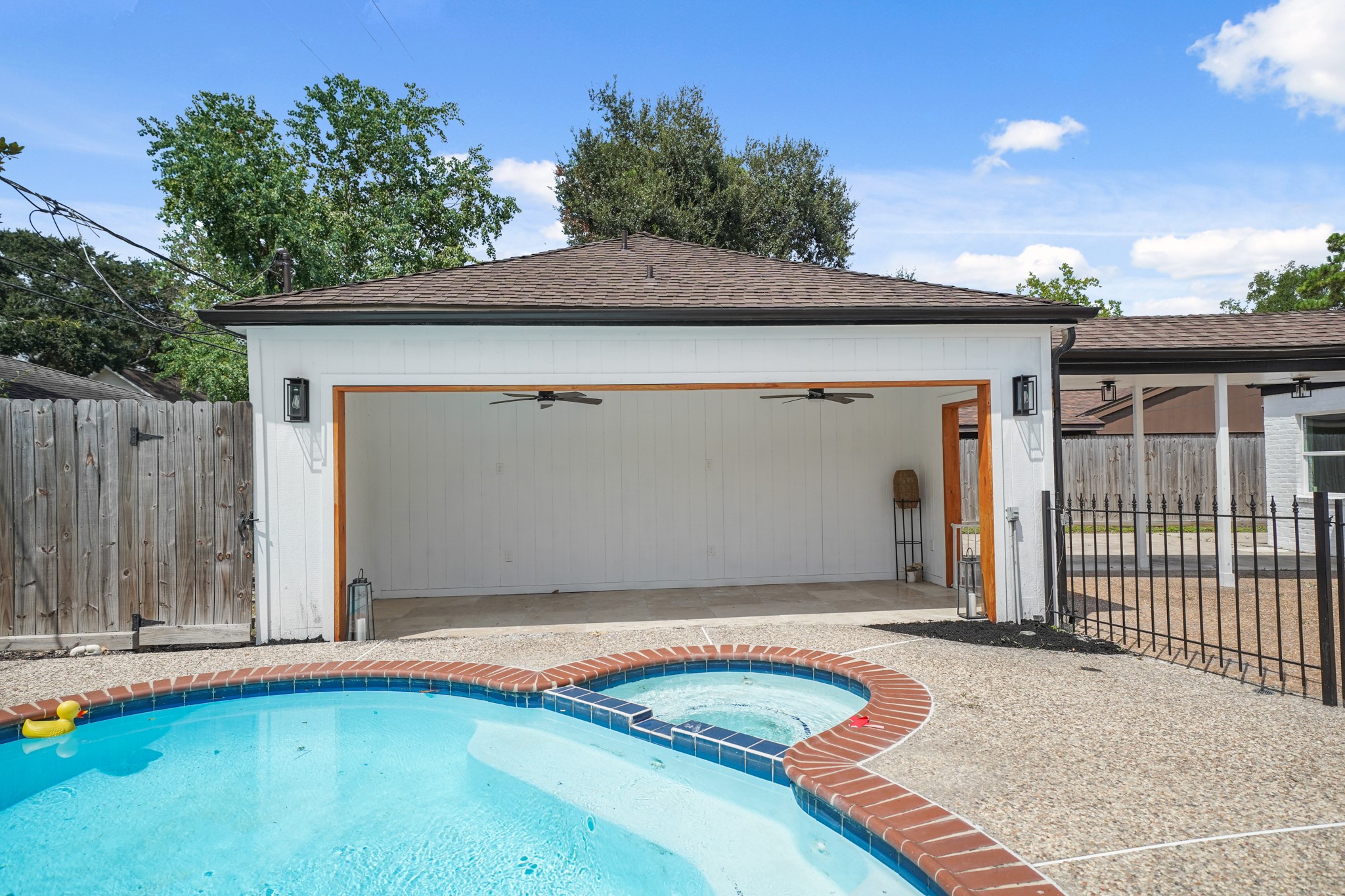 10031 Inwood Drive Houston, TX 77042 - Photo 31 of 31 a view of a house with backyard and tree