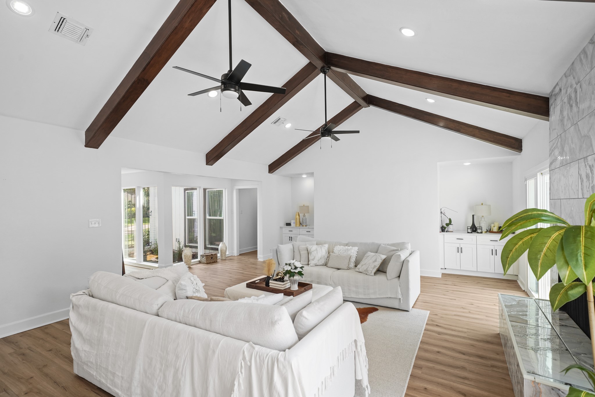 10031 Inwood Drive Houston, TX 77042 - Photo 8 of 31 a living room with furniture and a rug