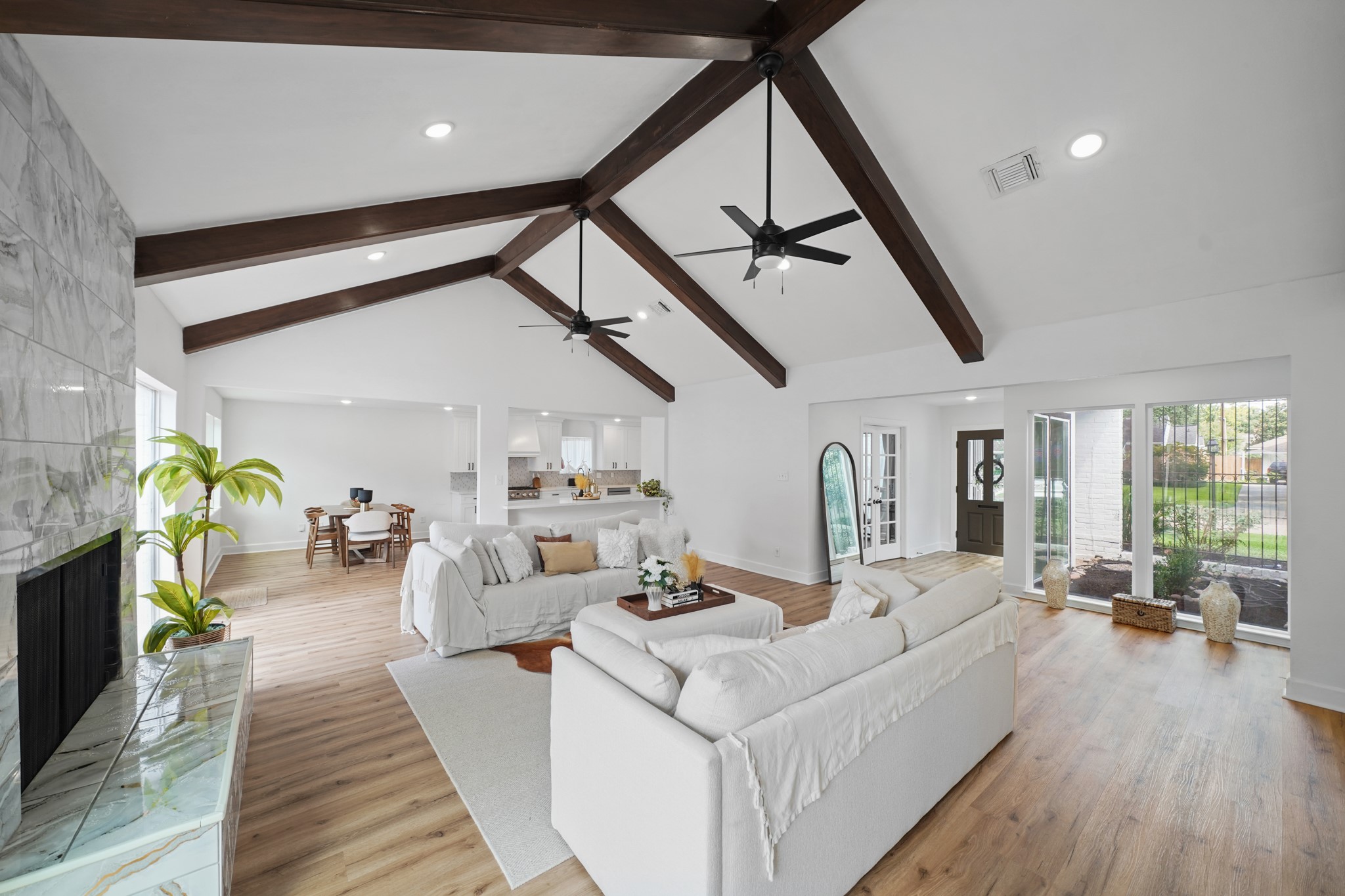 10031 Inwood Drive Houston, TX 77042 - Photo 9 of 31 a living room with furniture and a wooden floor